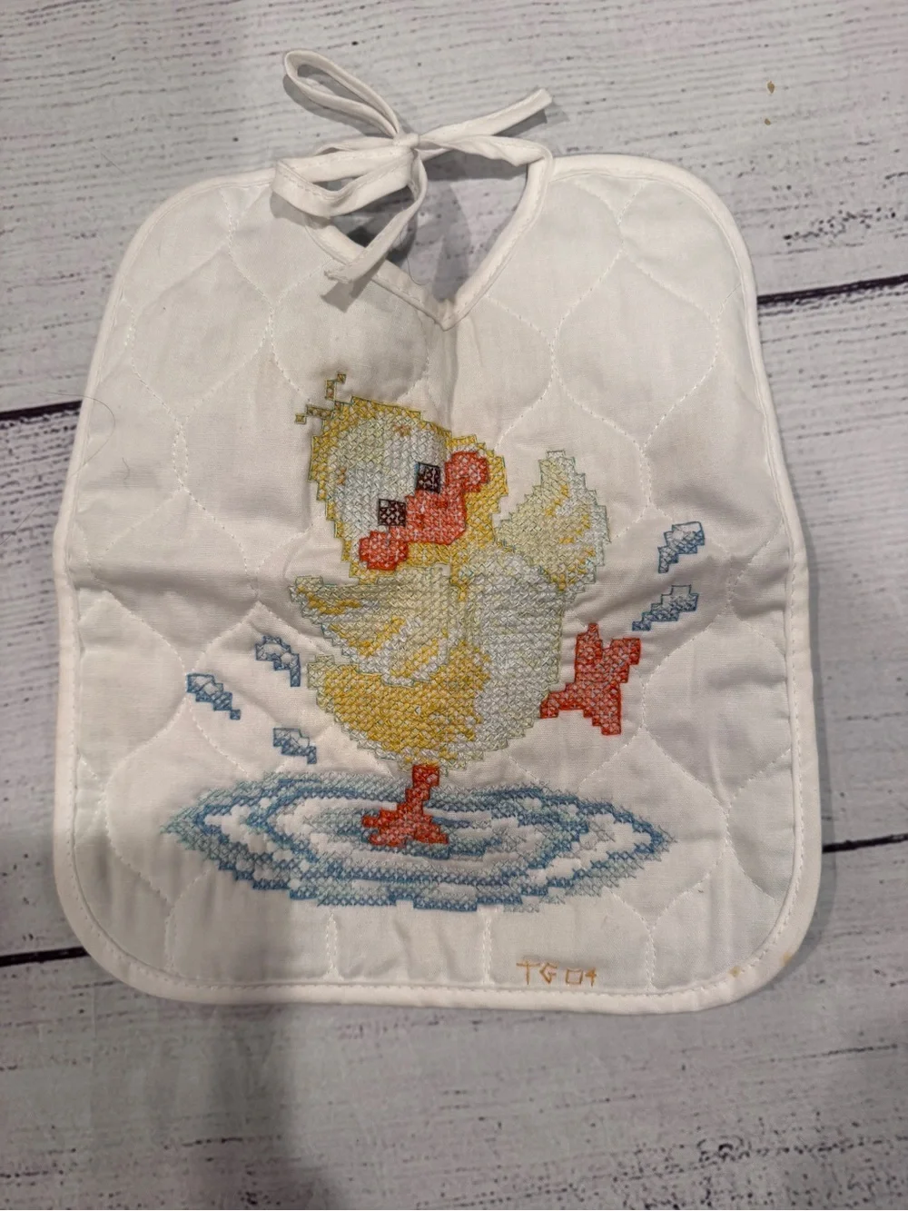 Vintage White Quilted Baby Bib with Cross-Stitch Duck